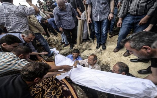 Searching for answers as the bury the dead in Turkey - VIDEO