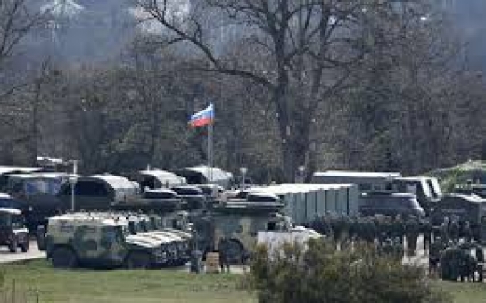 Russia says troops pulling back from Ukraine border