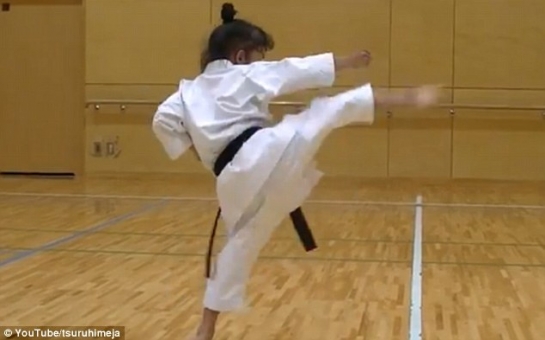 Fearsome seven-year-old girl shows off her black belt moves - VIDEO