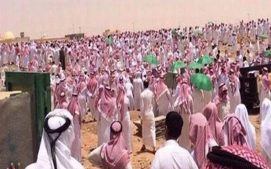 Thousands at a desert funeral of a student 'killed for being Muslim'