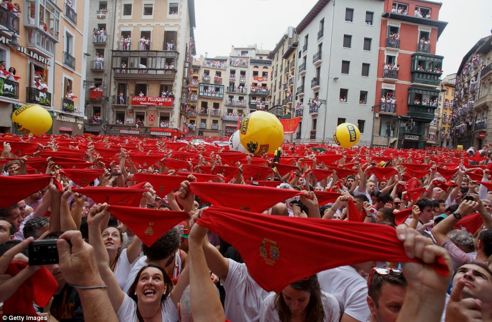 Thousands of revellers kick off iconic Spanish bull running festival - PHOTO