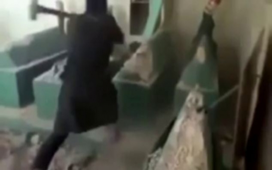 ISIS militants take sledgehammers to Mosul tomb of Prophet Jonah - VIDEO