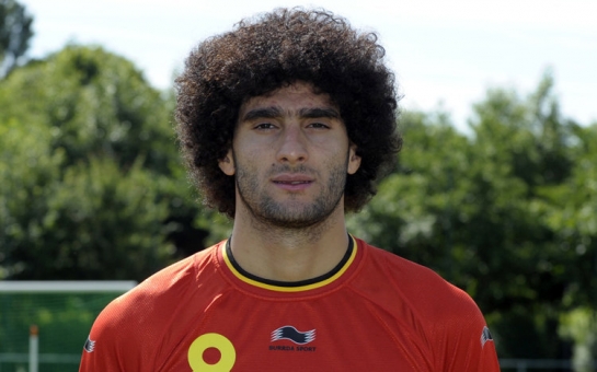 Marouane Fellaini chops off his famous afro