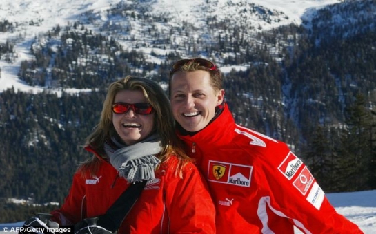 Schumacher's wife tells magazine he is 'getting better slowly'
