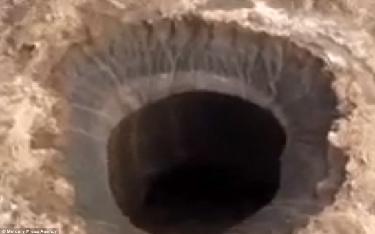 Scientists baffled by gigantic 262ft hole - VIDEO