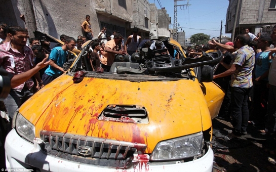 Israel and Palestinians bury their dead - PHOTO