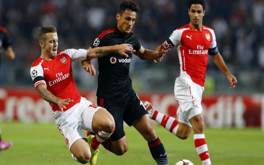 Ramsey sent off, but Arsenal earn draw in Istanbul