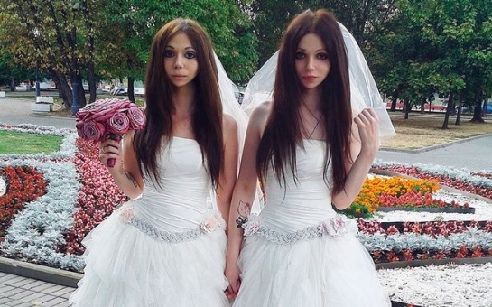 Identical couple are now bride and groom - PHOTO