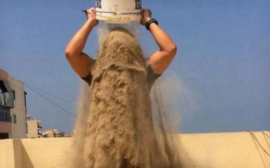 Rubble bucket challenge is Gaza's answer to the ice bucket craze