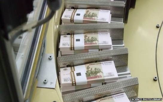 Russians urged 'don't panic' as rouble hits new low