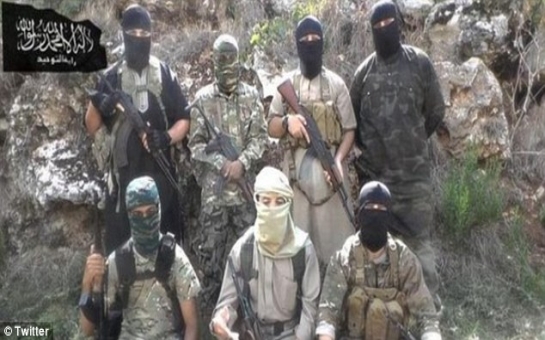 Seven British jihadis photographed in terror picture holding AK47