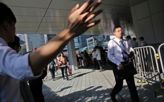 Hong Kong protests: civil servants allowed to return to work