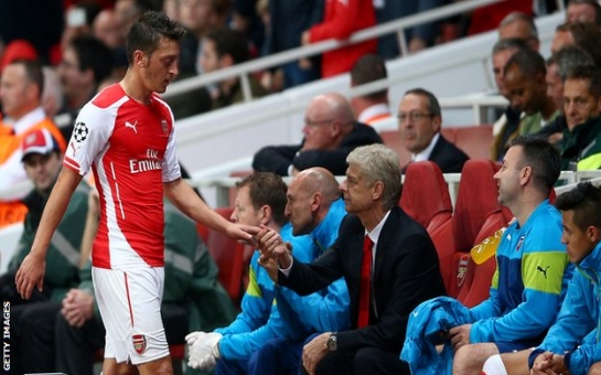 Mesut Ozil: Arsenal midfielder out with knee injury for up to 12 weeks