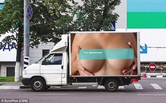 Advert featuring woman’s breasts causes 500 accidents in a DAY - VIDEO