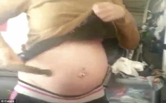 Moment heavily pregnant woman hits belly with HAMMER - VIDEO