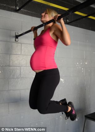 Body-builder mother gives birth to healthy baby boy - PHOTO