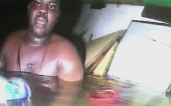 Moment divers found man trapped alive in sunken ship - VIDEO