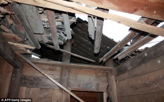 Man claims rocket crashed through the roof of his house