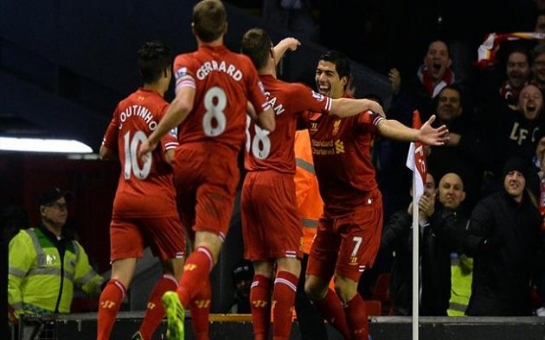 Four-goal Suarez destroys Norwich