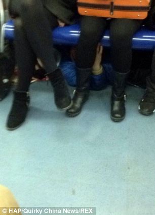 Pervert spotted hiding under seats on Beijing Metro trains - PHOTO+VIDEO