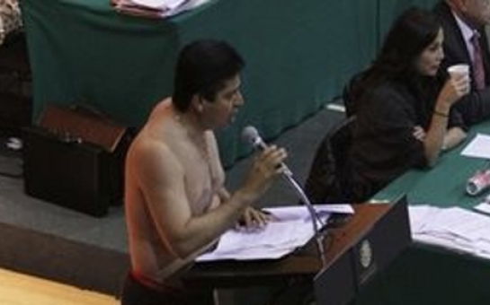 Mexican congressman takes off his clothes in angry protest at historic energy privatization bill - PHOTO