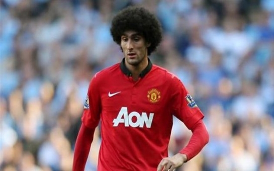 Fellaini out for six weeks after wrist surgery