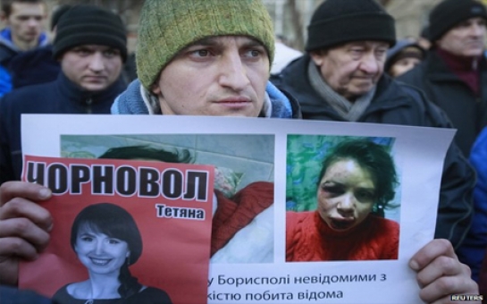 Ukraine activist beating: Three held