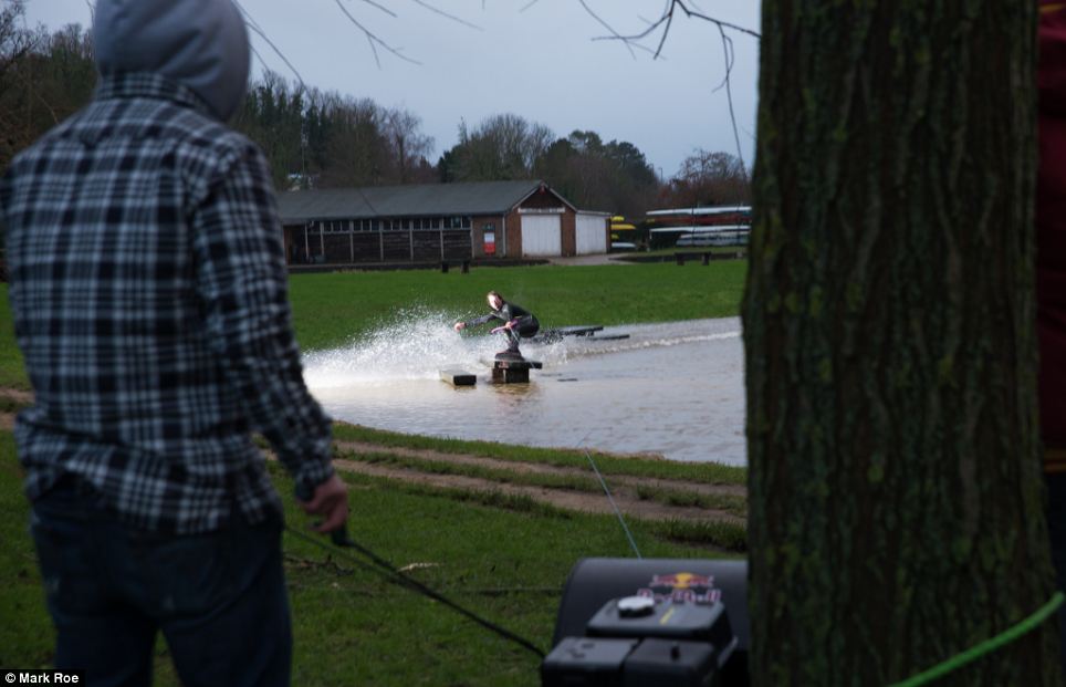 Daredevils use flooded car-park as wakeboarding playground - PHOTO+VIDEO
