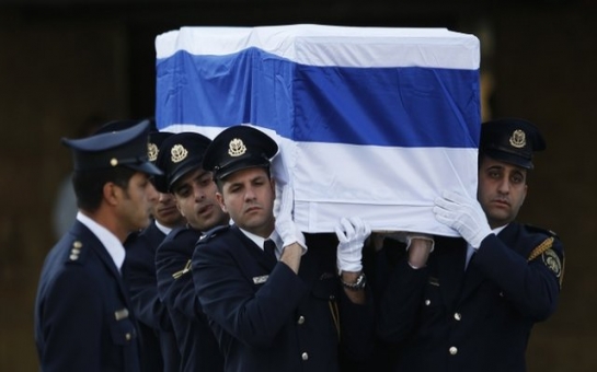 Israel holds burial service for Ariel Sharon