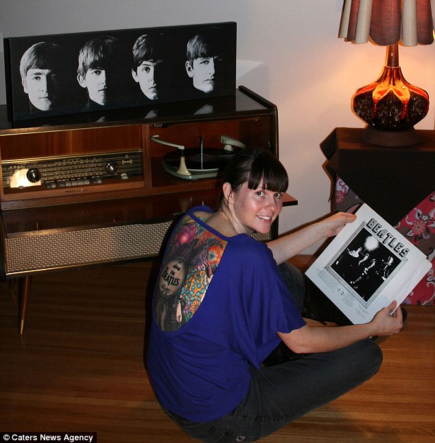 Superfan spends 50hrs getting giant back tattoo dedicated to Beatles - PHOTO