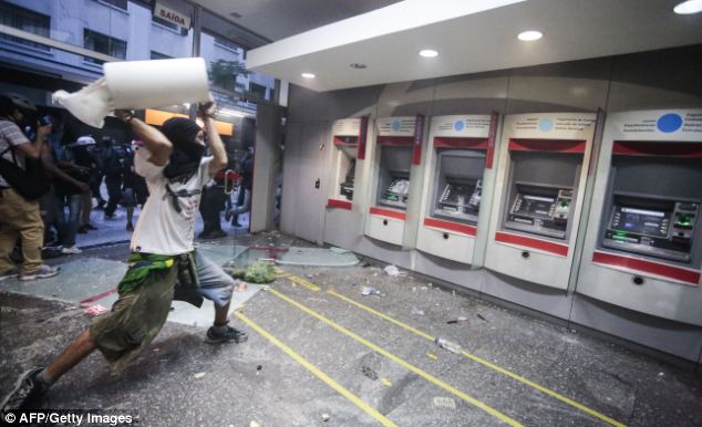 Violence breaks out in Brazil as anti-World Cup protesters swarm Sao Paulo - PHOTO