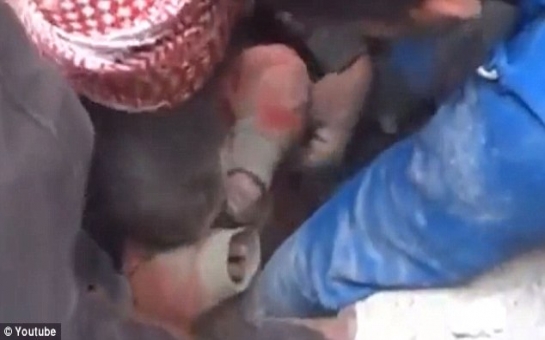 Dramatic moment men pull baby from rubble - VIDEO