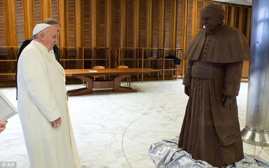 Francis is presented with a chocolate statue of himself