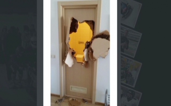 Trapped in Sochi bathroom, bobsledder punches hole in door