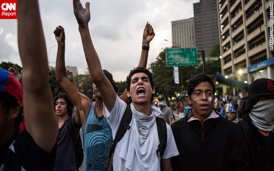 Cheered by supporters, Venezuelan opposition leader Lopez surrenders