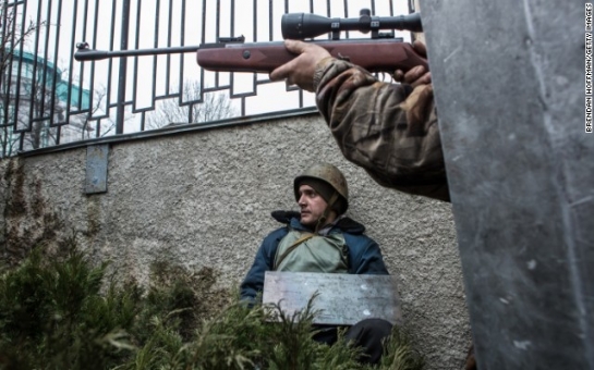 Ukraine unsettled, uneasy as peace deal sinks in