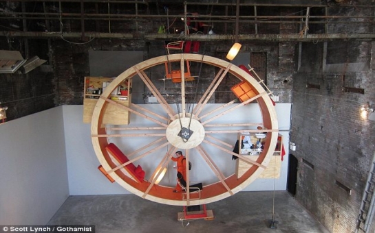 Men eating, sleeping and working inside a giant hamster wheel - PHOTO+VIDEO