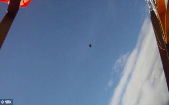 Skydiver is nearly hit by a falling METEORITE - VIDEO