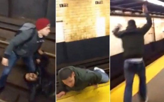 Moment a man survives being run over by subway train - VIDEO