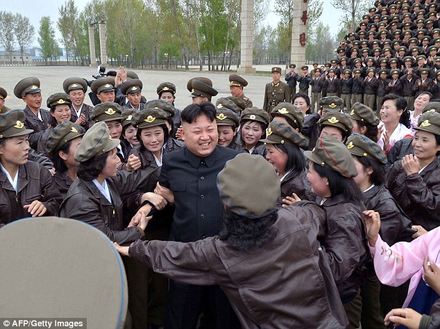 North Korean dictator is mobbed by troop of screaming female soldiers - PHOTO