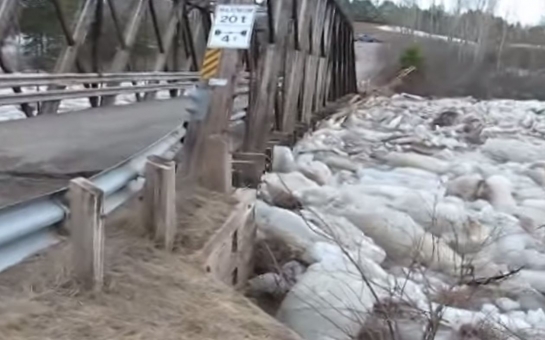 Bridge shifting up to six feet by river of ice boulders - VIDEO