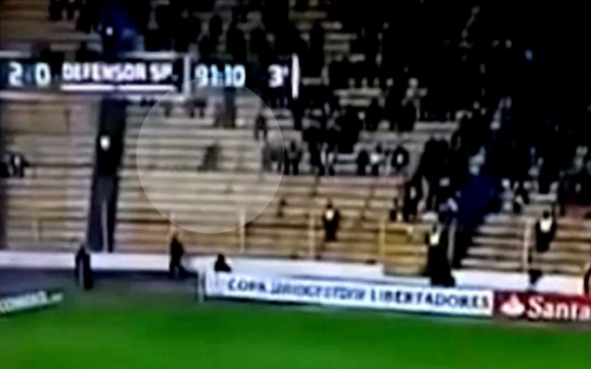 'Ghost' appears to run through fans during football match - VIDEO