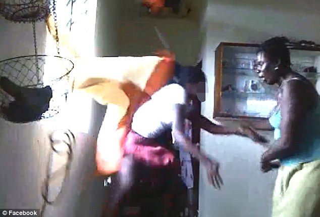 Mother brutally whipping her daughter for posing semi-nude - PHOTO+VIDEO