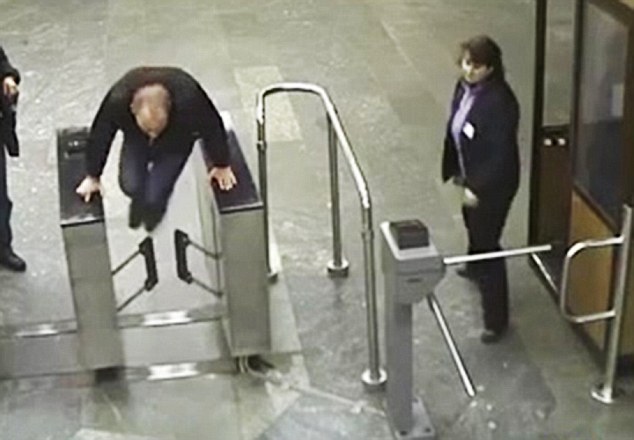 Ukrainian man tries to jump over 1ft-high ticket barrier but...