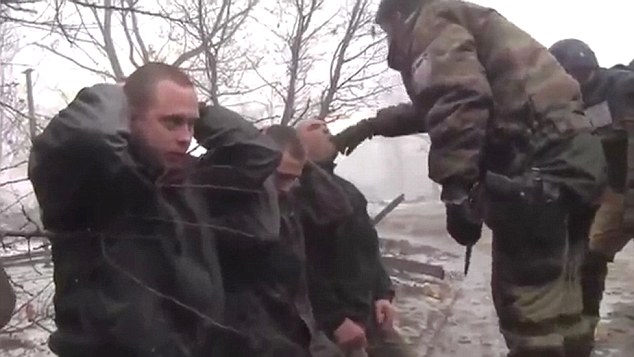Ukrainian soldiers' forced to EAT their uniform