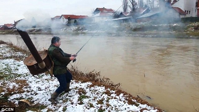 Serbian fisherman builds coal-powered backpack