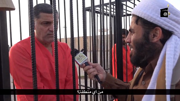 Twisted new ISIS video shows 'Kurdish Peshmerga' fighters paraded in cages