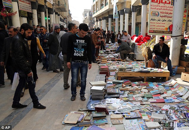 ISIS burn 10,000 books and more than 700 rare manuscripts