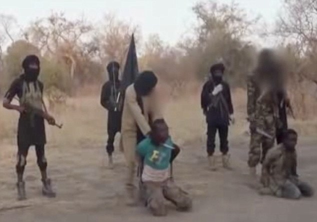 Boko Haram video shows two men being beheaded accused of spying