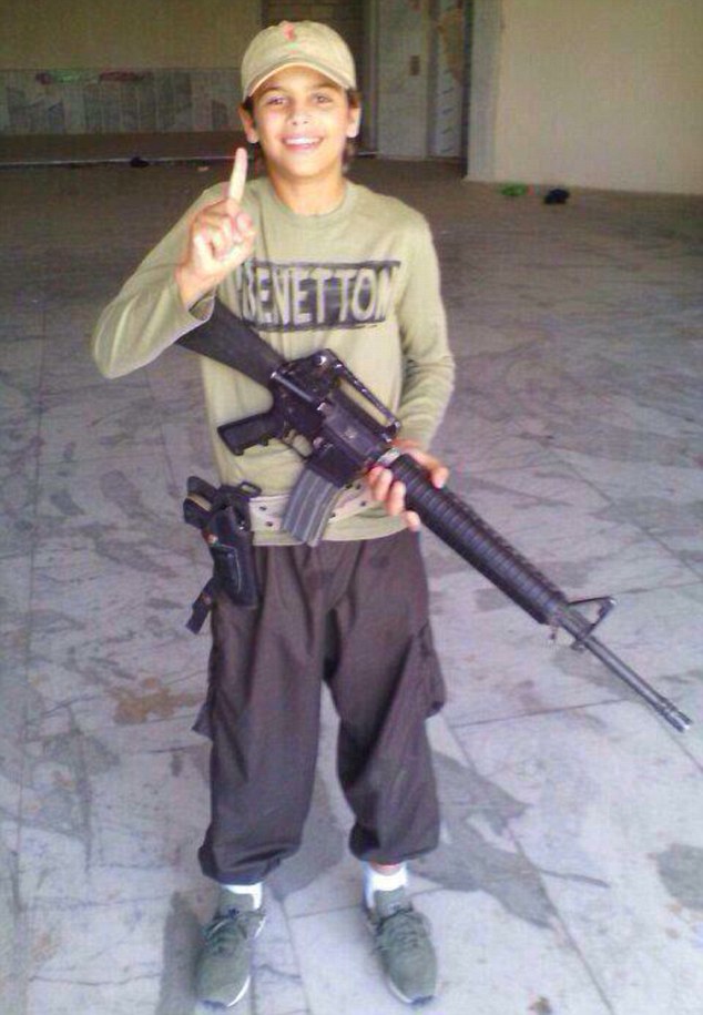 Boy, 13, had posed with M-16 assault rifle before being killed in Syria